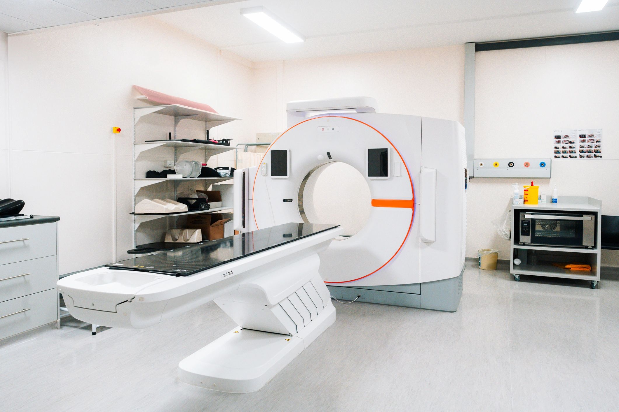 Modern advanced CT simulator imaging room with diagnostic equipment for radiation therapy planning