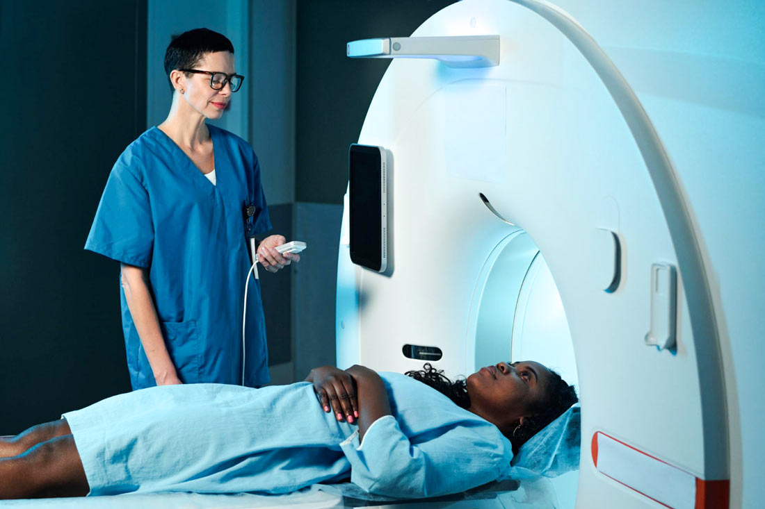 MR Personnel with female patient
